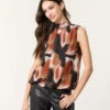 Printed Sleeveless Puff Hem Blouse(Printed Sleeveless Puff Hem Blouse)